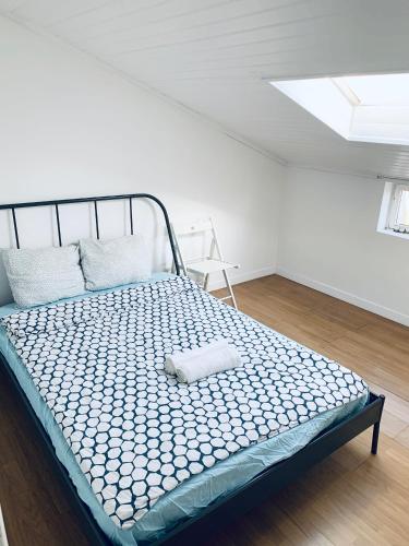 Ένα ή περισσότερα κρεβάτια σε δωμάτιο στο Restelo House Shared Appartment