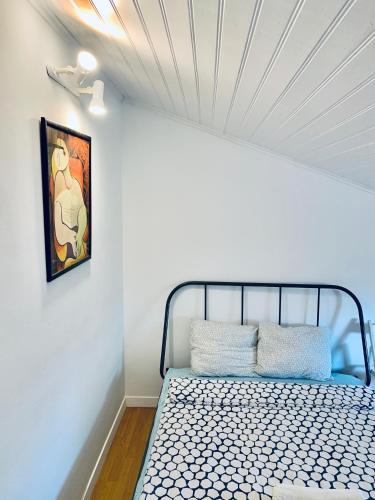 Ένα ή περισσότερα κρεβάτια σε δωμάτιο στο Restelo House Shared Appartment