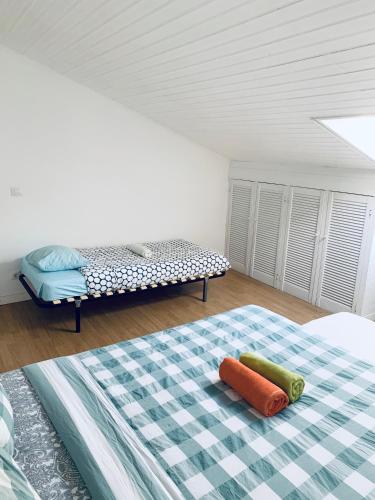 Ένα ή περισσότερα κρεβάτια σε δωμάτιο στο Restelo House Shared Appartment