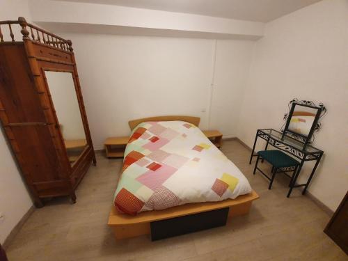 Giường trong phòng chung tại Appartements "Le Casino" et "Lou petit"