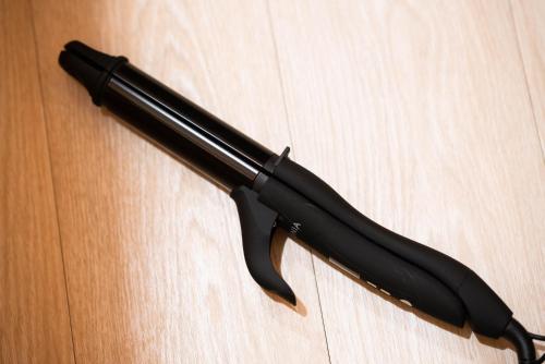 a black umbrella sitting on top of a table at kaguya asakusa Women only guest house in Tokyo
