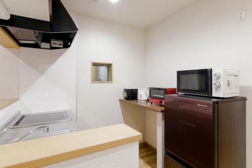 Dapur atau dapur kecil di Crescent Moon Nakanoshimbashi