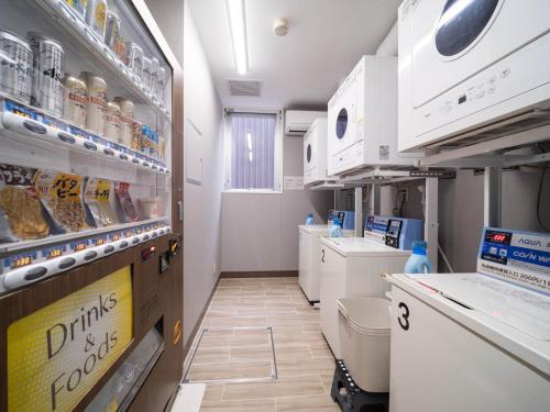 Küche/Küchenzeile in der Unterkunft Super Hotel Marugame Ekimae