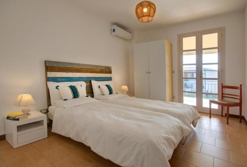 Ένα ή περισσότερα κρεβάτια σε δωμάτιο στο Villa Rosa