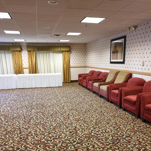 Area soggiorno di Hawthorn Extended Stay by Wyndham Kingsland