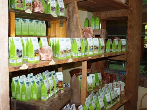 a store with shelves filled with lots of products at Landhotel zum Honigdieb in Ribnitz-Damgarten