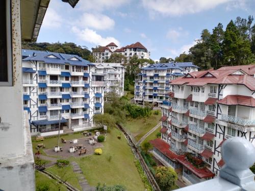 an aerial view of a group of apartment buildings at MERLIN HOME DESA ANTHURIUM in Tanah Rata