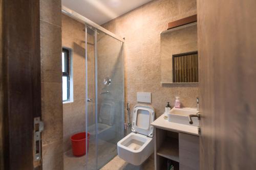 Un baño de Uma Residency