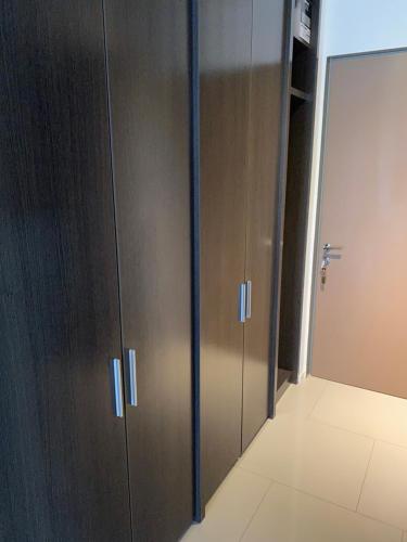 a pair of wooden lockers in a room at Palermo Soho Apartment Guemes in Buenos Aires
