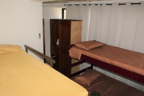 Postel nebo postele na pokoji v ubytování Posada Casamar2 alojamiento en San Andrés islas