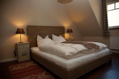 Ліжко або ліжка в номері Gästehaus Gut Füchtel und Gut Welpe