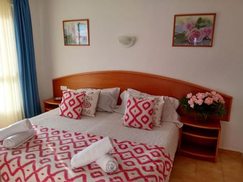 Ліжко або ліжка в номері Apartamentos Villa Margarita