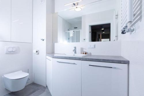Koupelna v ubytování Resort Apartamenty Klifowa Rewal 30
