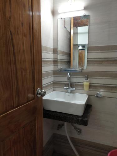 Koupelna v ubytování Hotel Prabhat