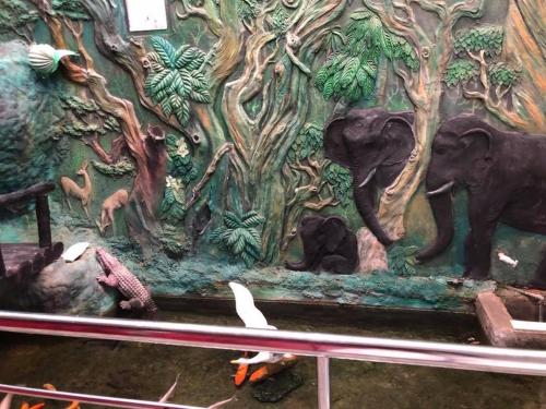a wall with a painting of elephants on it at Sunset Beach Residence in Panadura