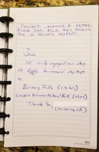 a piece of paper with a pen on it at Cedar Ridge Retreat Lake Almanor in Lake Almanor