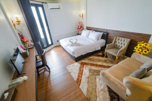 Ein Sitzbereich in der Unterkunft The MACEO Hotel