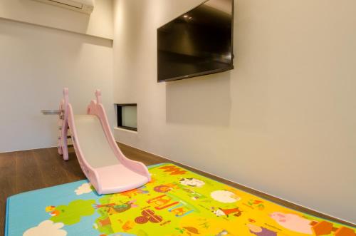 TV a/nebo společenská místnost v ubytování 礁溪320山館 Jiaoxi Shanguan B&B