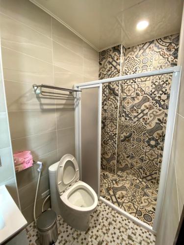 Un baño de 奧斯卡海景民宿Oscar Boutique Seaview Homestay