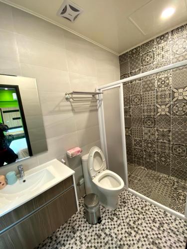 Un baño de 奧斯卡海景民宿Oscar Boutique Seaview Homestay