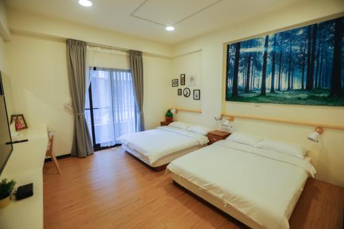 Katil atau katil-katil dalam bilik di Forest Park Homestay