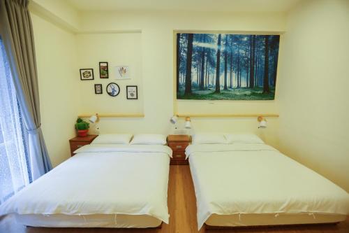 Katil atau katil-katil dalam bilik di Forest Park Homestay