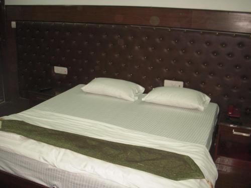 Cama o camas de una habitación en Rams Inn
