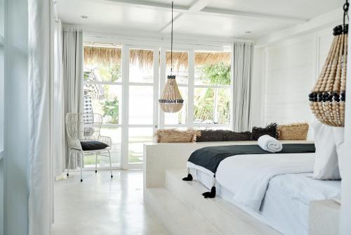 White Palm Hotel Uluwatu Baliにあるベッド