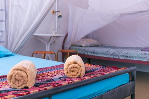 Postel nebo postele na pokoji v ubytování Voyage Guesthouse