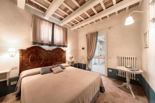 Кровать или кровати в номере Il Casale Di Giulia