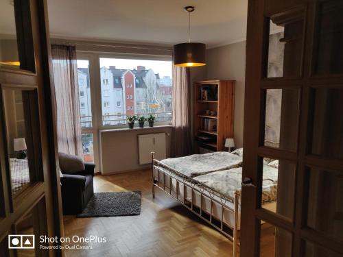 Postel nebo postele na pokoji v ubytování Apartament Park