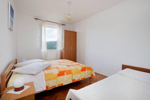 Katil atau katil-katil dalam bilik di Apartments Lina 2023