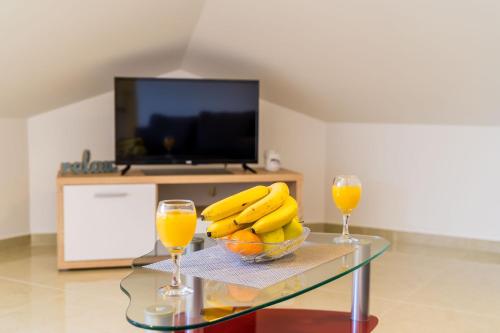 Μια τηλεόραση ή/και κέντρο ψυχαγωγίας στο Apartments Šmanjak