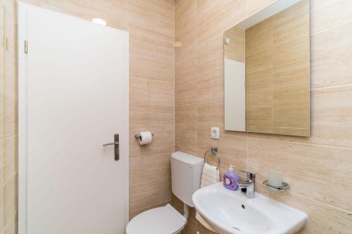 Ένα μπάνιο στο Apartments Šmanjak