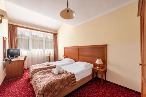 Hotel Stodółkaにあるベッド