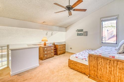a bedroom with a bed and a ceiling fan at Lake Chelan Shores II in Chelan