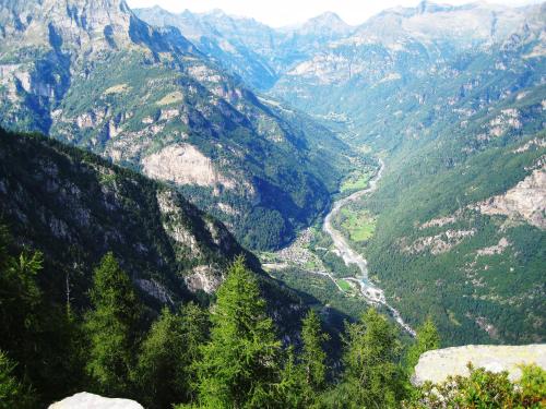 a view of a mountain valley with a river at Casa Marco in Brione