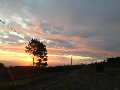 Amanecer o atardecer desde la casa vacacional o alrededores