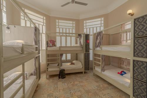 
A bunk bed or bunk beds in a room at Casa Avelina Hostal
