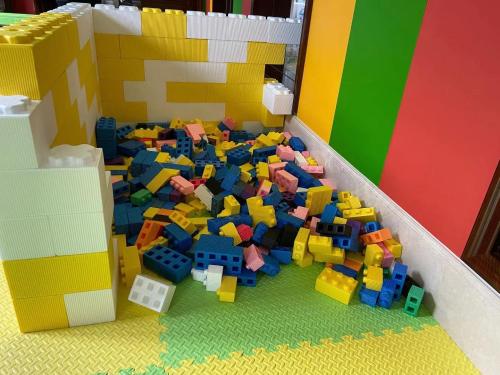 a pile of legos laying on the floor in a lego room at SSAW Boutique Hotel Lishui Jiarui in Lishui