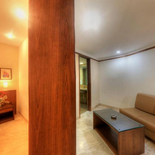 Zona de estar de Hotel Deepa Comforts
