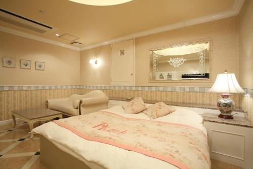 Letto o letti in una camera di HOTEL Birth （ホテルバース）