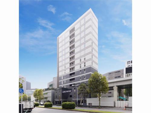 a rendering of a tall white building at JHotelTokyoGEO in Tokyo