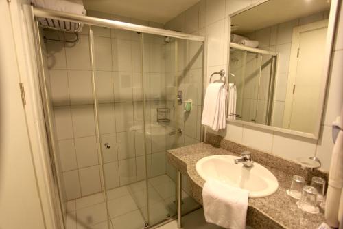 a bathroom with a sink and a shower at AQI Pegasos Royal in Avsallar