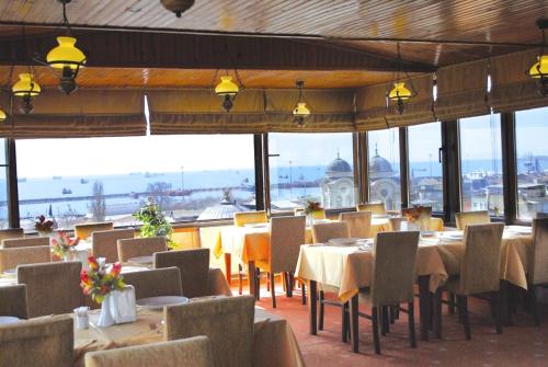 Un restaurant sau alt loc unde se poate mânca la Grand Liza Hotel