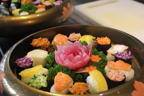 a bowl filled with different types of vegetables at Crowne Plaza Huangshan Yucheng by IHG in Huangshan