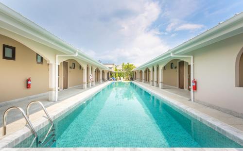 Bazén v ubytování BARA BARA' Budget SATUN 'SHA Plus' nebo v jeho okolí