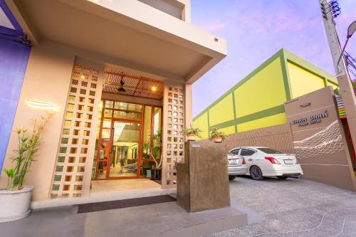 a house with a car parked outside of it at BARA BARA' Budget SATUN 'SHA Plus' in Satun