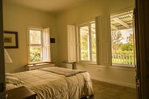 מיטה או מיטות בחדר ב-Casa Nueva Zelanda