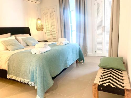 Кровать или кровати в номере Top Apartment in Los Jardines de las Golondrinas